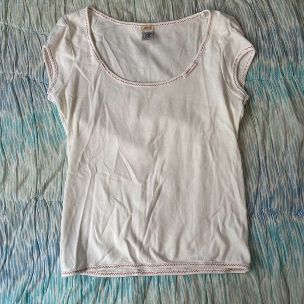 cap sleeve top with red thread detail